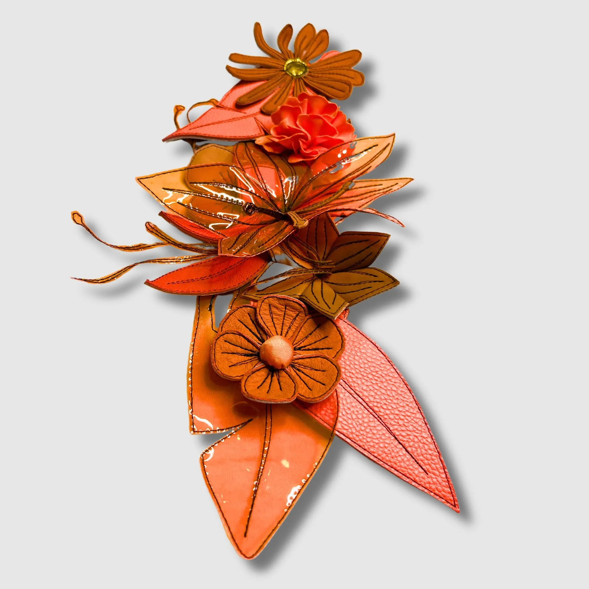 orange floral brooch